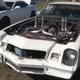 Illustration for article titled Some Mad Genius Built A Quad-Turbo Camaro With Junkyard Ford Parts